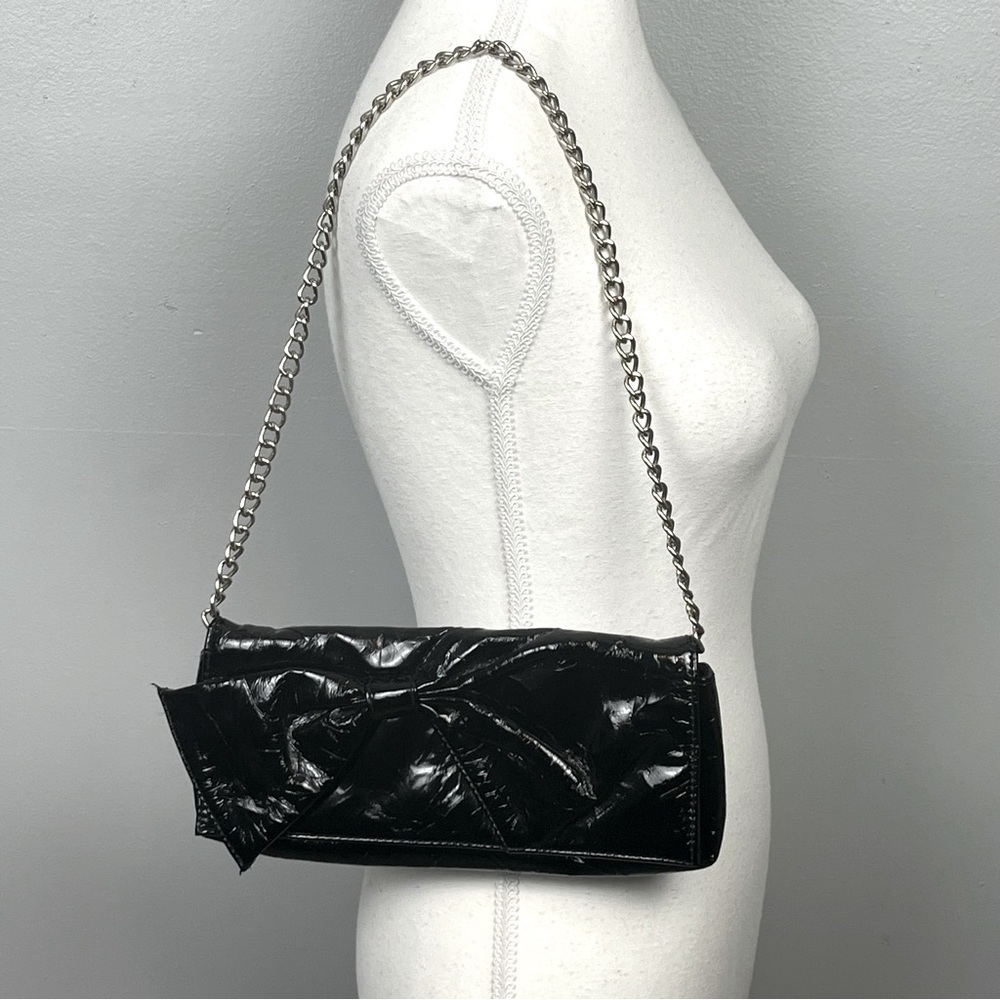 Jessica McClintock black crinkle patent knotted bow shoulder/clutch bag.